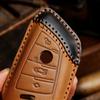 Applicable to BMW key cover X5 blade 530LI new 5 series 325 leather car key cover Douyin explosion