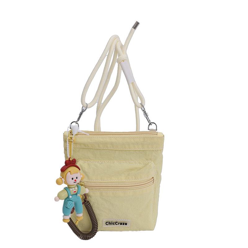 Shoulder bag women's solid color couple outdoor summer new lightweight messenger bag men's and girls outdoor sports small satchel