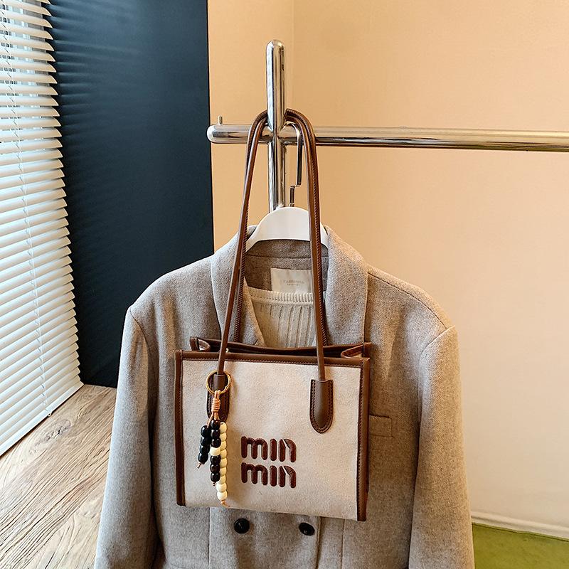 

Замшевая сумка женская 2025 новая осень и зима ретро сумка через плечо сумка-тоут для通勤 большая вместимость женская сумка хаки