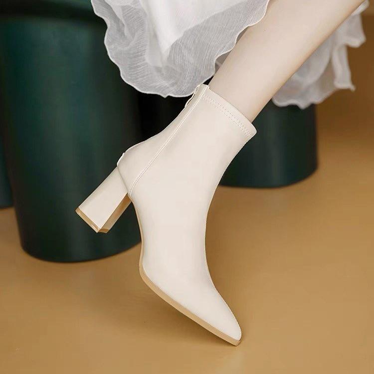

French high-heeled short boots women s 2024 spring and autumn new thick-heeled Martin boots small pointed white elastic thin boots 35