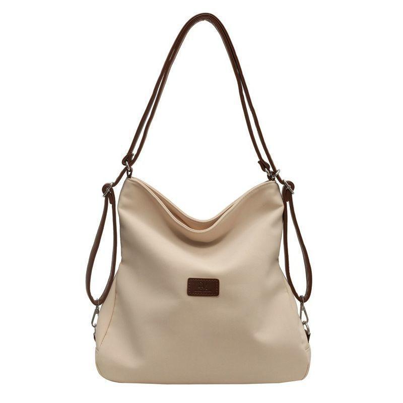 Autumn and winter one pack three-purpose backpack 2025 new backpack schoolbag college student shoulder messenger bag popular shoulder bag