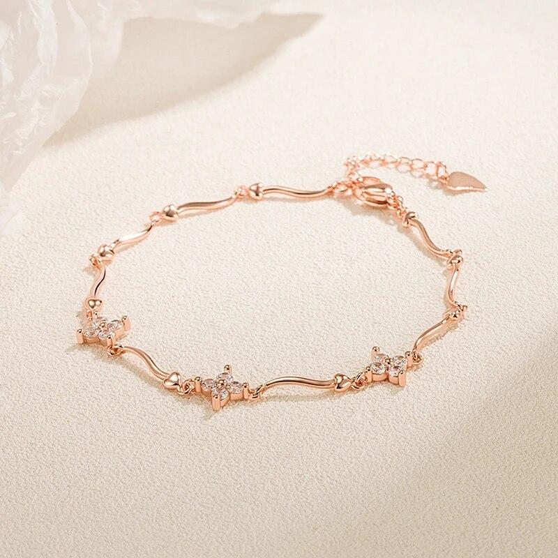 

ANENJERY браслет-цепочка со сверкающими циркониями и четырьмя листочками, светильник, роскошный дизайн для женщин, простой дизайн, вечерние ювелирные изделия, подарки About 22cm ярко-розовый