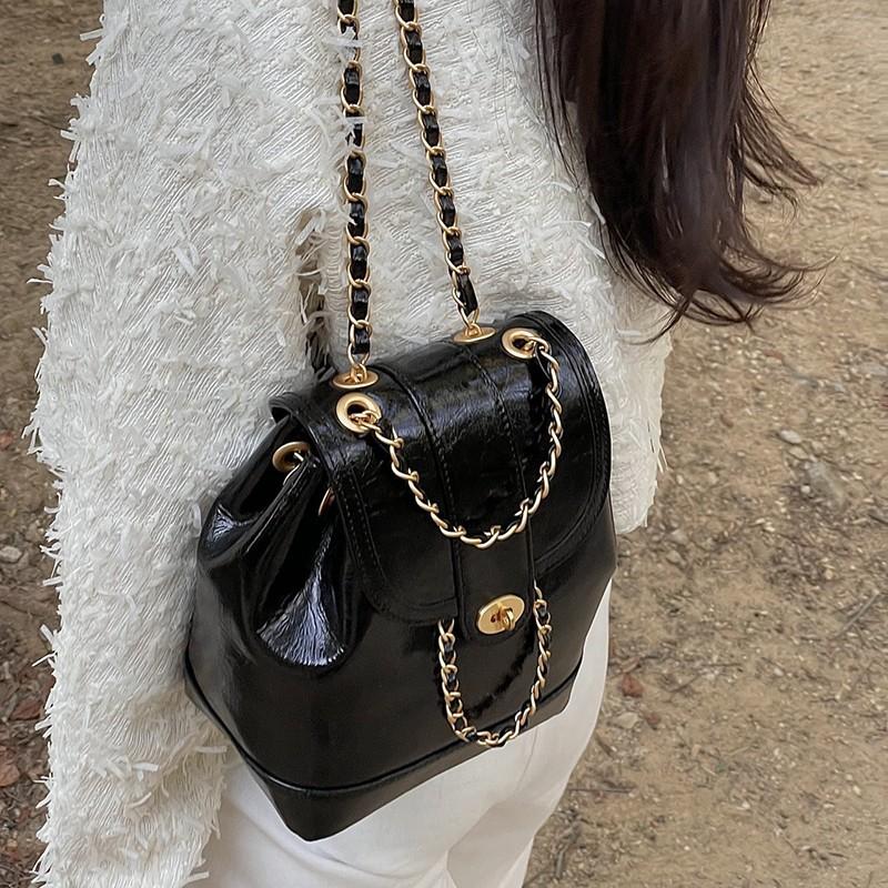 Street Fashion Cool Oil Wax Leder Bucket Handtaschen Kontrastfarbene Autonähte und Metallkettenschloss Diebstahlsichere Taschen Schultern und Umhängetaschen