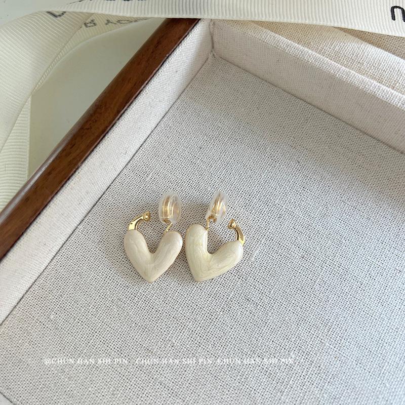 

Love drop glaze ear clips without ear holes, high-end niche design, light luxury mosquito coil disc earrings, spring and summer popular ear buckles