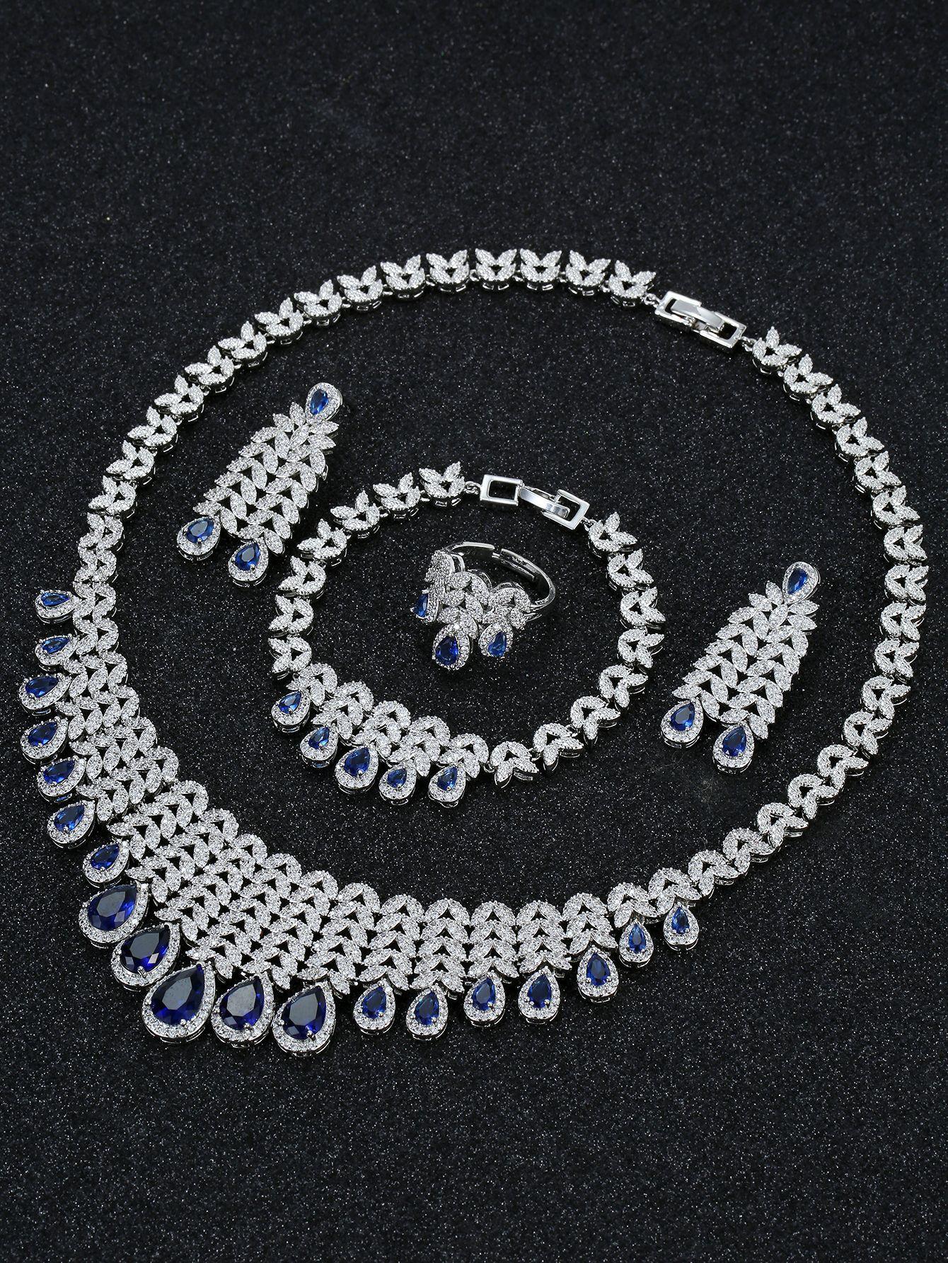 

Комплект из ожерелья, серег, браслета и кольца. Свадебный комплект украшений для невесты, для ужина. Комплект из четырех предметов. Женская праздничная бижутерия. синий