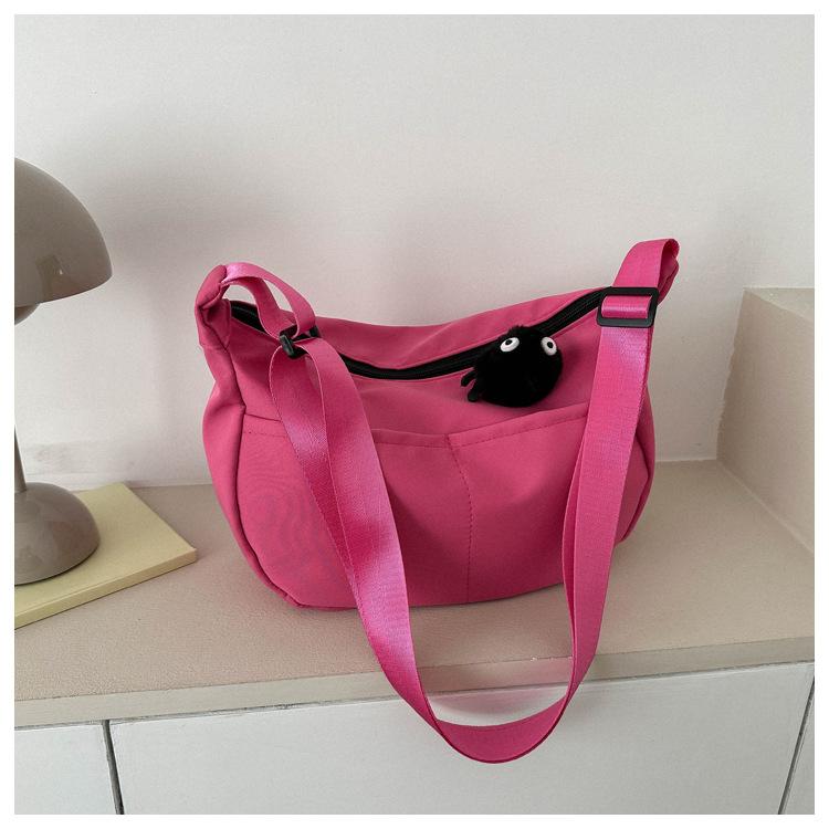 Spring new fashionable versatile solid color messenger bag casual simple dumpling bag street trend large capacity schoolbag