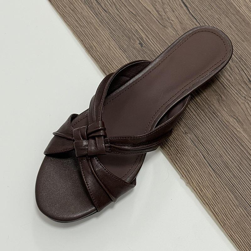 Cowhide version! Temperament commuter wedge heel one-word cool slippers women's new kinked open-toed half slippers