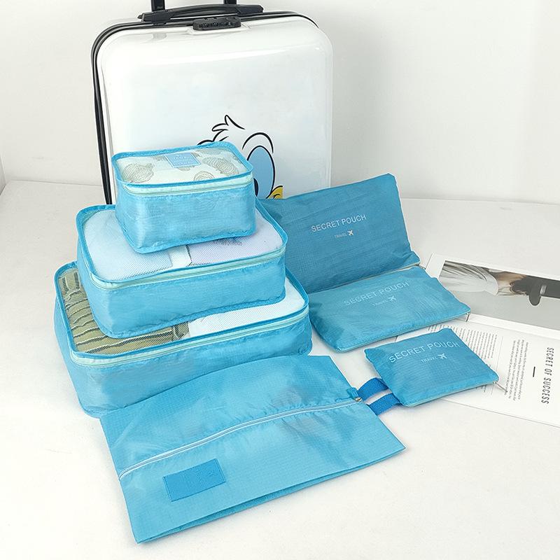 Seven-Piece Travel Luggage Set with Clothing and Shoe Storage Bags