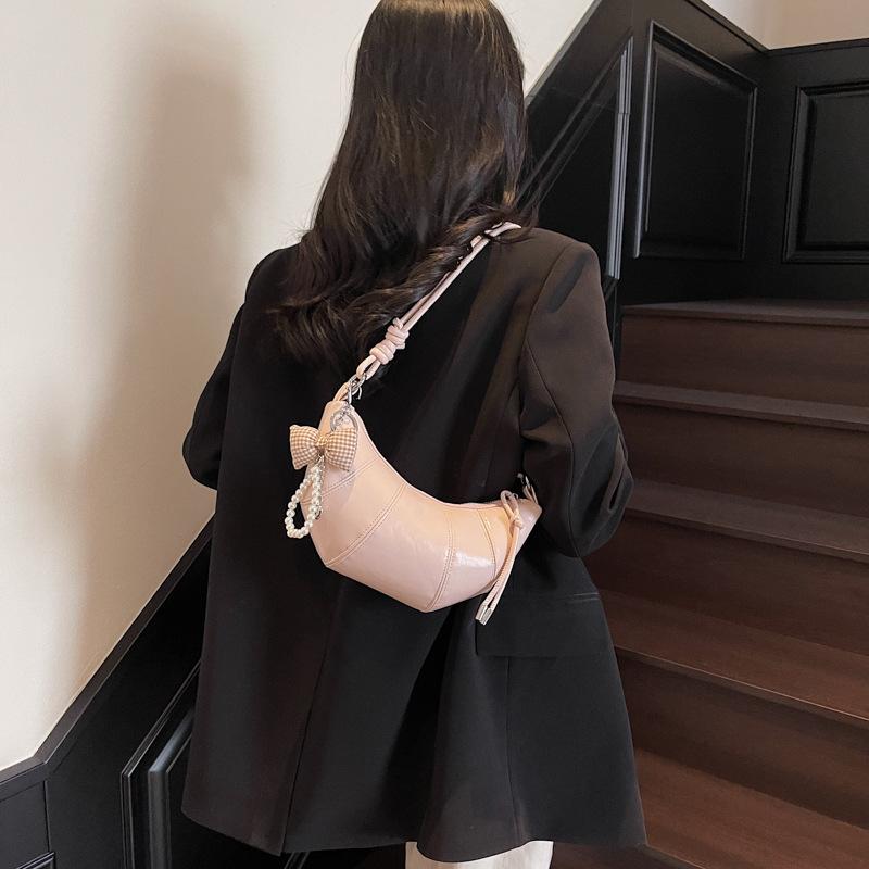 Korean version of trendy fashion shoulder bag women's 2025 new high-end temperament women's bag hand carry simple casual dumpling bag