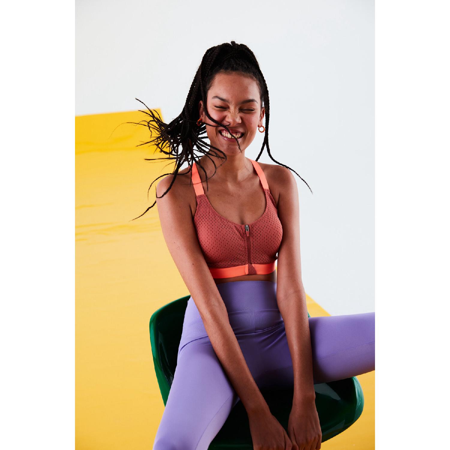 

Розовый спортивный бюстгальтер с молнией спереди