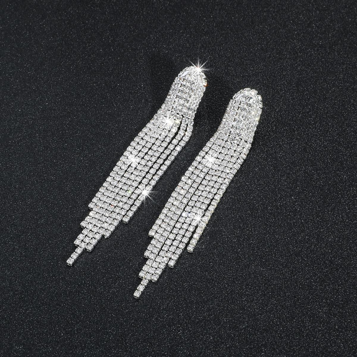 

Премиальное чувство роскоши супер-вспышки длинные серьги с кисточками из кристаллов модный темперамент универсальные серьги вечерние серьги женские серьги 1 пара