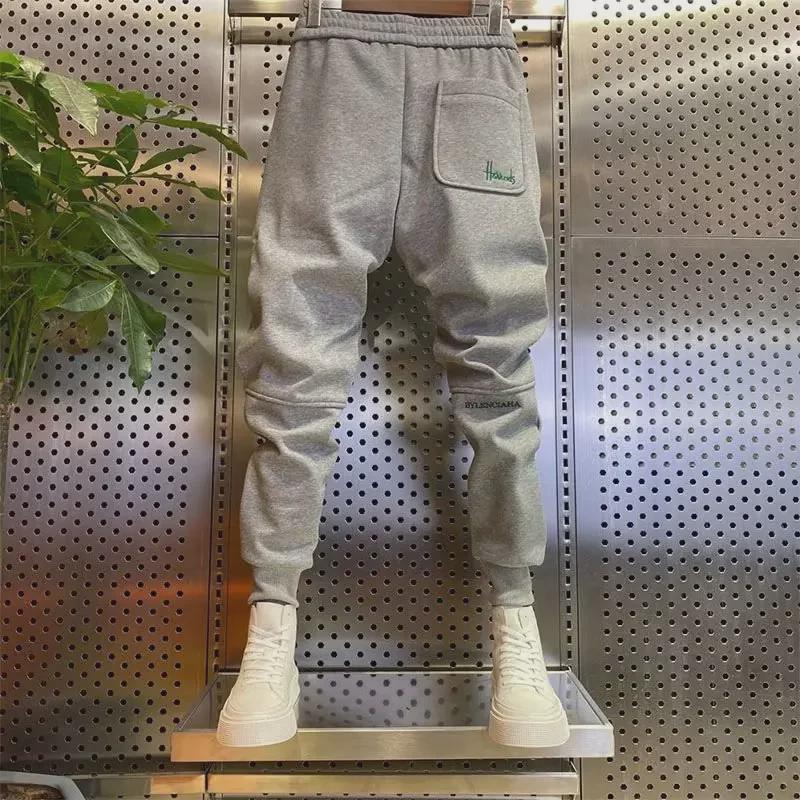 Pánské sportovní kalhoty s výšivkou slim fit - Trendy ležérní tepláky na jaro/podzim