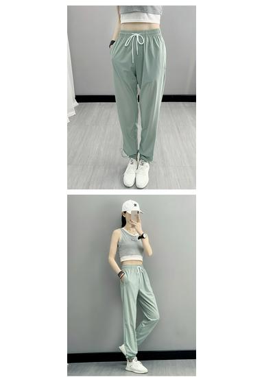 Women's Plus Size Ice Silk Quick-Dry Sports Pants - Breathable, Elastic & Perfect for Yoga and Running.