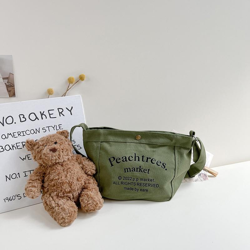 

Adorable Cartoon Canvas Crossbody Bag For Boys And Girls Lightweight And Fun зелений