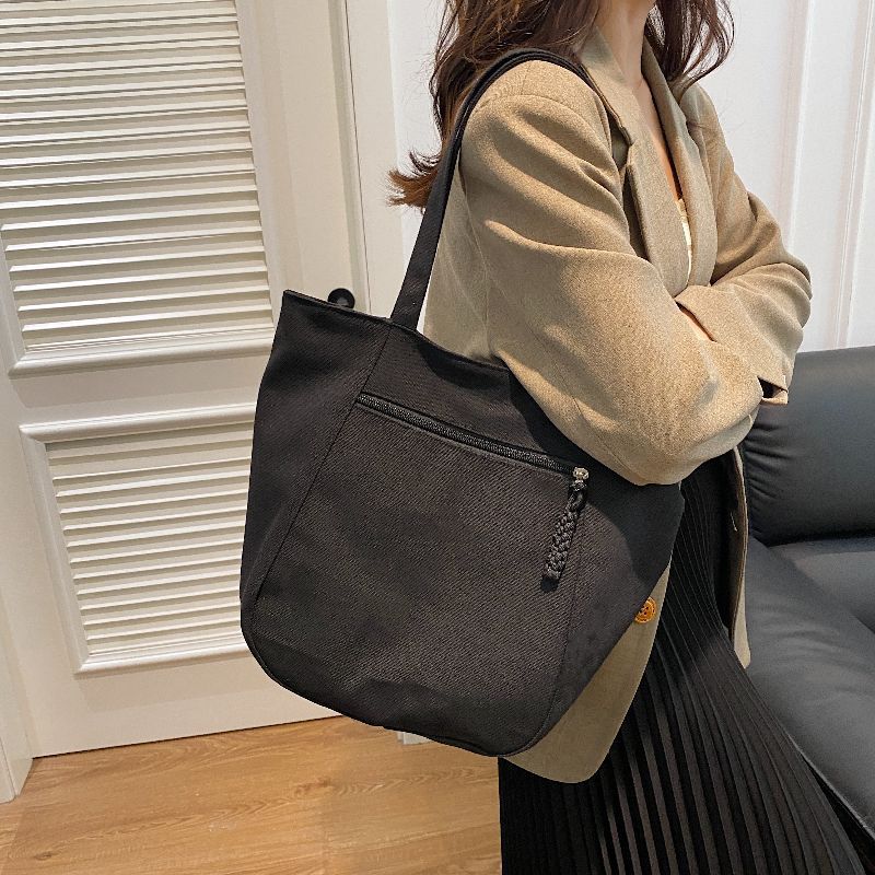 Customized bags for women 2025 new large-capacity tote bags, commuter tote bags, student women's shoulder bags.