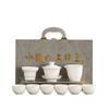 Dehua suet jade porcelain tea set is a complete set of gold-painted white porcelain household tea making utensils Company