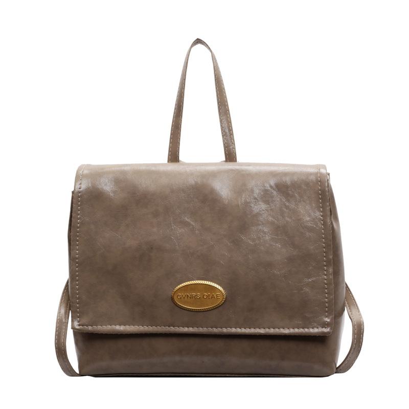 Koreanische Taschen für Damen im Herbst und Winter Neuer Retro Ölwachs Leder College Studenten Klassenrucksack Modische Handtaschen