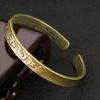 Traditional Tibetan Mantra Bangle Oxidized Brass Chain Bracelet With Resizable Fit And Cultural Symbolism