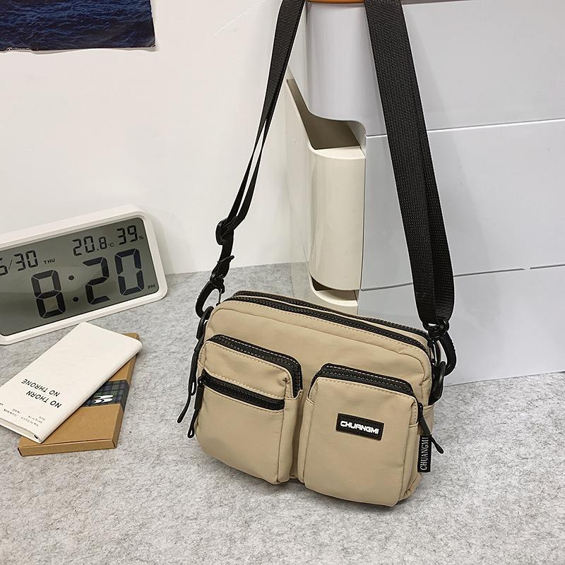 Outdoor leisure multi-pocket canvas messenger bag women's and men's simple travel nylon single shoulder small square bag