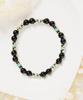 Jbans Classic Gold Blue Point Black Onyx Gemstone Bracelet (C2601Ac1384_Bk)
