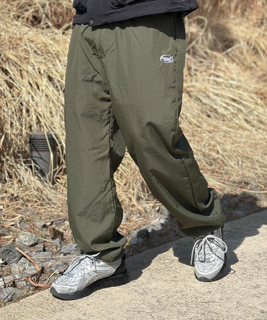 PEACEOFMIND Logo Nylon Wide Track Pants (Khaki)