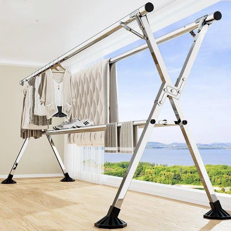 Bold Stainless Steel Folding Clothes Drying Rack - Floor-Standing, Telescopic, Indoor/Outdoor Use, Vertical Hanging Rod.