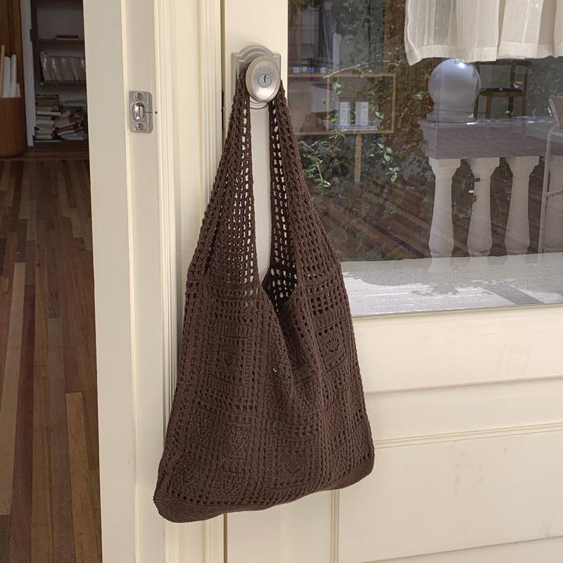 

Нова шикарна порожниста ткана сумка lazy wind, повсякденна універсальна в язана літня сумочка для подорожей 57*35*2 колір темно кави