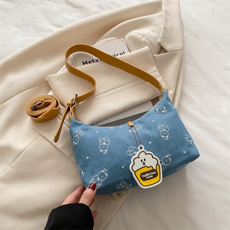 

Cute printed contrasting color underarm bag fashionable versatile women s messenger bag light luxury texture portable shoulder bag high value светло-синий