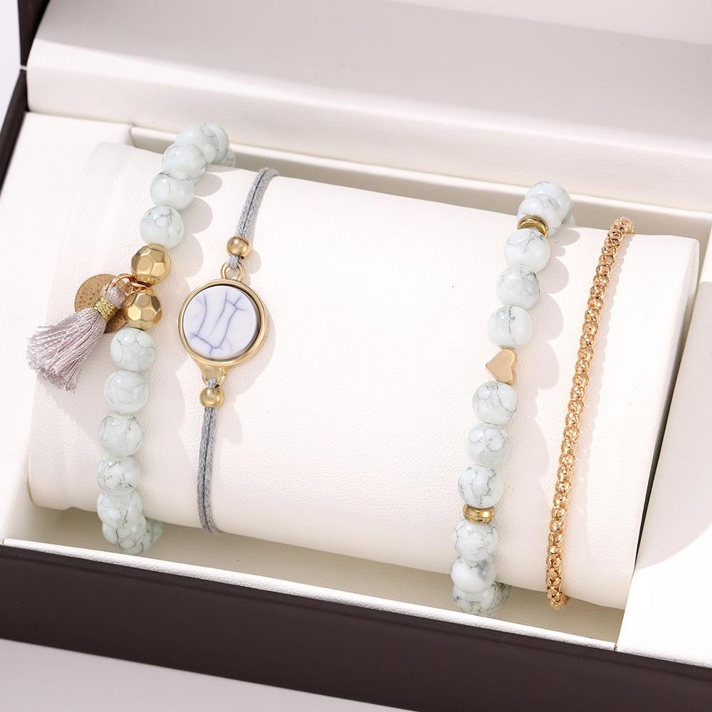 

Набор из 4 предметов Женские креативные браслеты с бирюзовыми кисточками и круглыми камнями Модный трендовый стиль Ощущение высокого класса Аксессуары для браслетов
