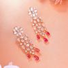 Estele Designer Rose Gold Plated Earrings with Shimmering CZ Studs and Pink Tourmaline Stones for Women