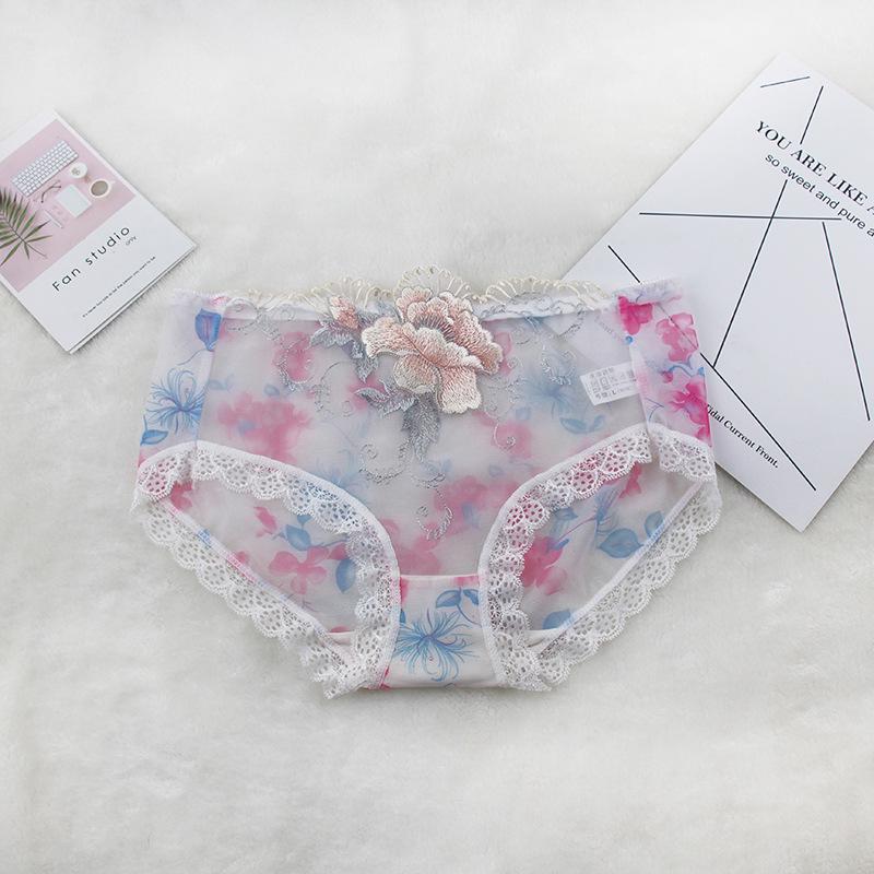 

Жіночі прозорі трусики середньої посадки з мереживом та вишивкою трояндами M білий