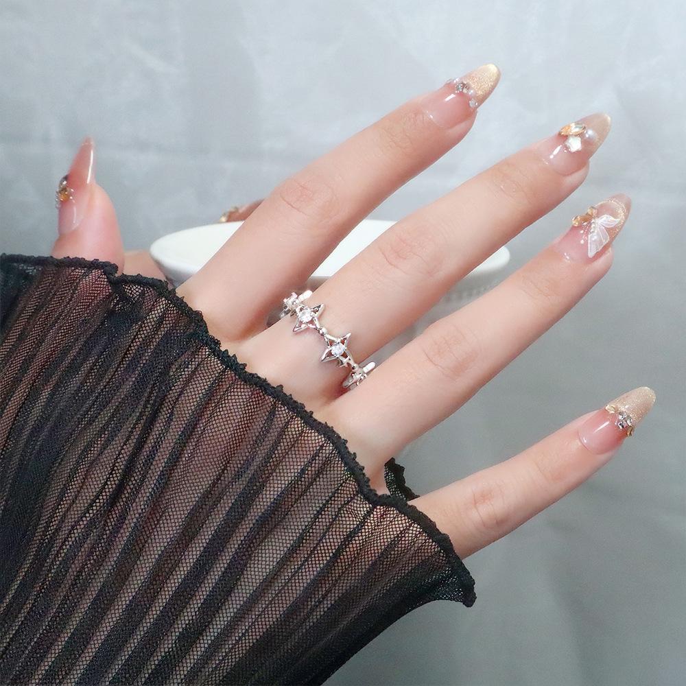 Four-Pointed Zircon Star Ring: Dreamy, Creative Double Star Design with Single Diamond.