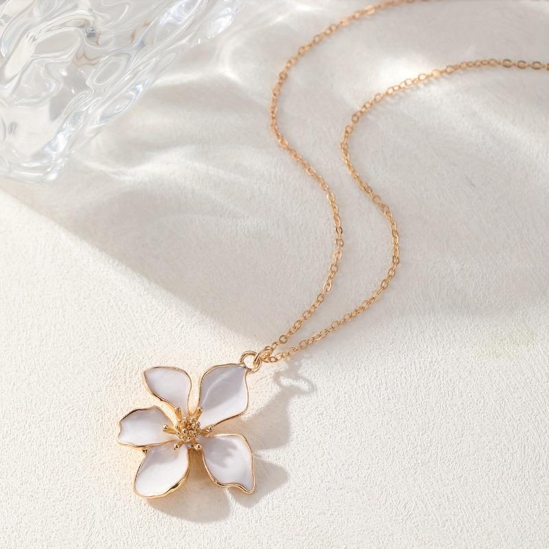 Fashion flower pendant necklace with white enamel petals. Elegant daily jewelry for casual, formal and vacation wear, perfect gift for women.
