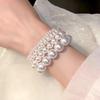Elegant Multi-Piece Faux Pearl Bracelet for Women - Versatile, Elastic, and Stackable.
