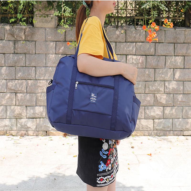 Trendy Waterproof Folding Travel Bag: Large Capacity Trolley Luggage & Fitness Storage