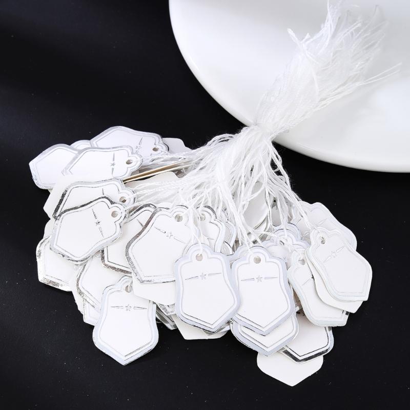 Förpackning med 500 st Guld/Silver Pappersstjärna Formade Prislappar Stadigt Papper Förstansade Hål För Detaljhandel Smyckesdisplay Festdekorationer