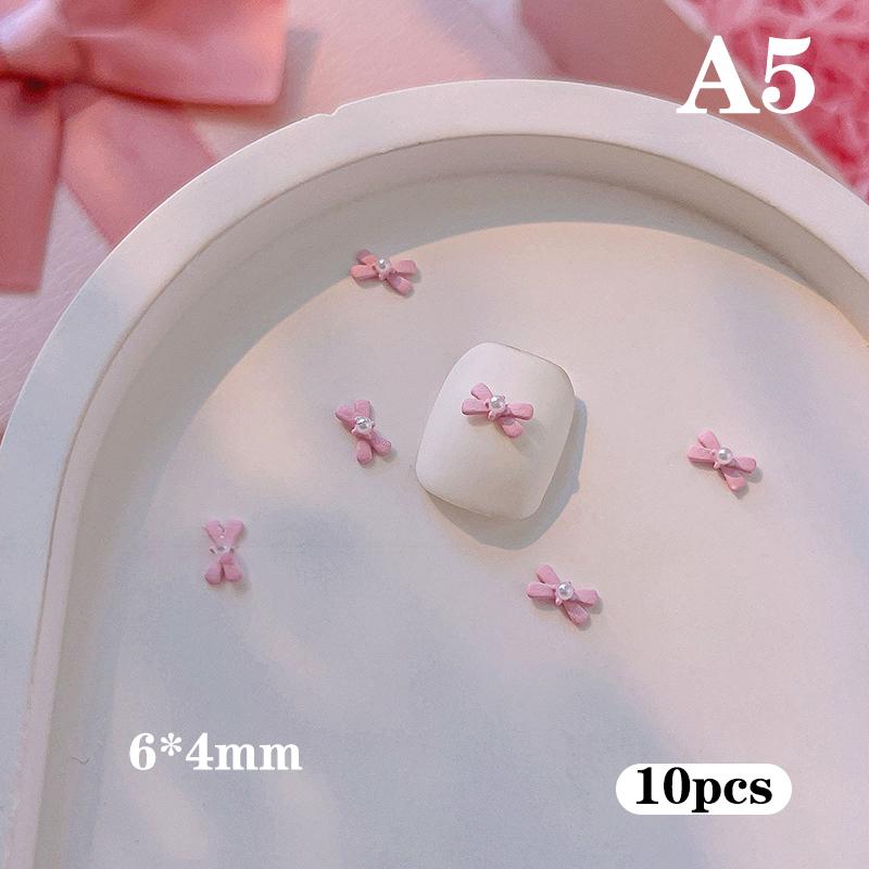 10 Stück Lange Rosa Harz Schleife Nagelkunst Charme 3D Kawaii Mattierte Fee Nagel Schleifen Dekor Teile Diy Design Nagelzubehör