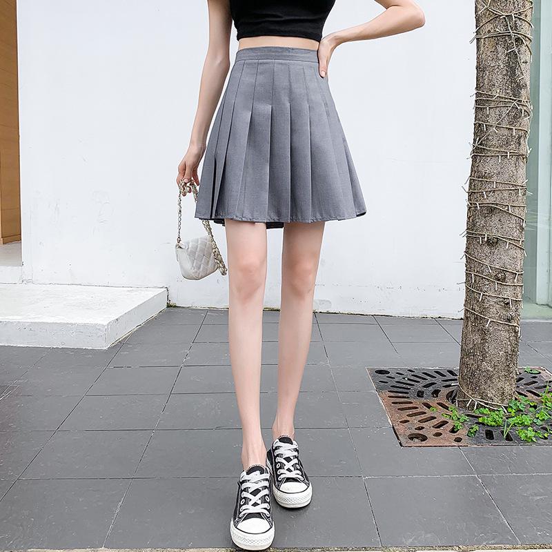 2024 Nová dámská sukně s vysokým pasem, jednobarevná, áčkového střihu, plisovaná, nadměrná velikost, střední délky, zeštíhlující, akademický styl