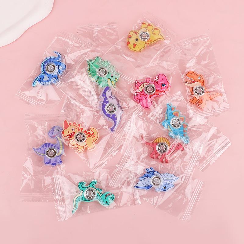12 Stück Dinosaurier Finger Kreisel Spielzeug für Kinder Dschungel Geburtstagsparty Mitgebsel Pinata Füller Stressabbau Drehender Fidget Spinner Geschenke
