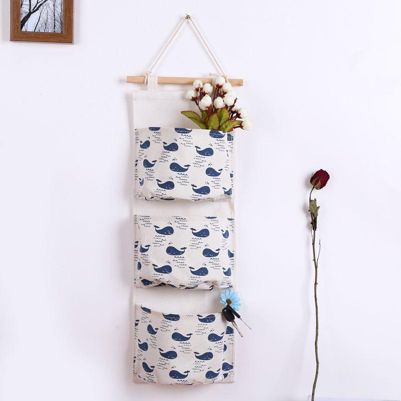 

Водонепроницаемая настенная сумка для хранения из хлопка и льна с тремя карманами и дизайном в виде ветки дерева Three-Pocket Hanging Bag