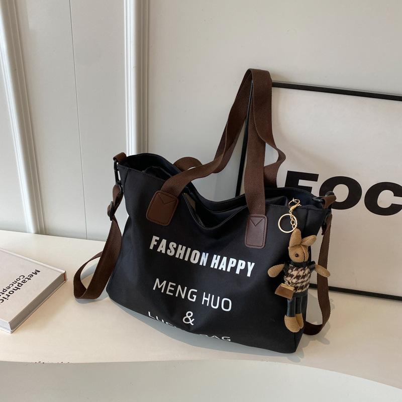 Canvas bag Women's oneshoulder literary and artistic largecapacity student tote bag Class versatile makeup bag Crossbody backpack