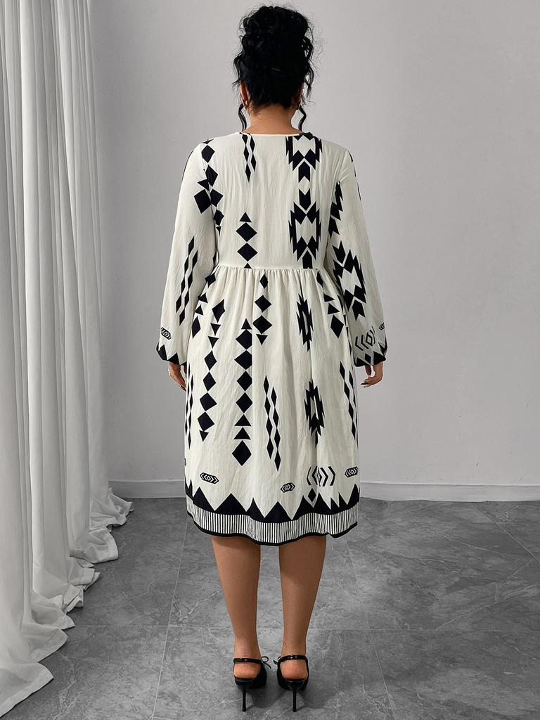 Foreign trade autumn and winter new dress large size fat mm printed bubble sleeve V-neck dress high waist and thin dress