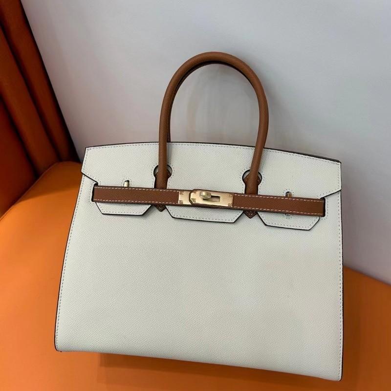 Two-layer EP Palm Pattern Leather Color Matching Platinum Bag (H13-2530BK)