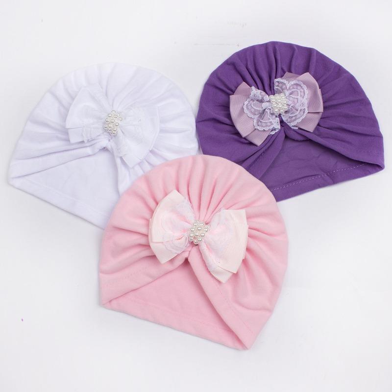 New baby velvet pearl bow hat, children's comfortable warm pullover hat, baby hat strap