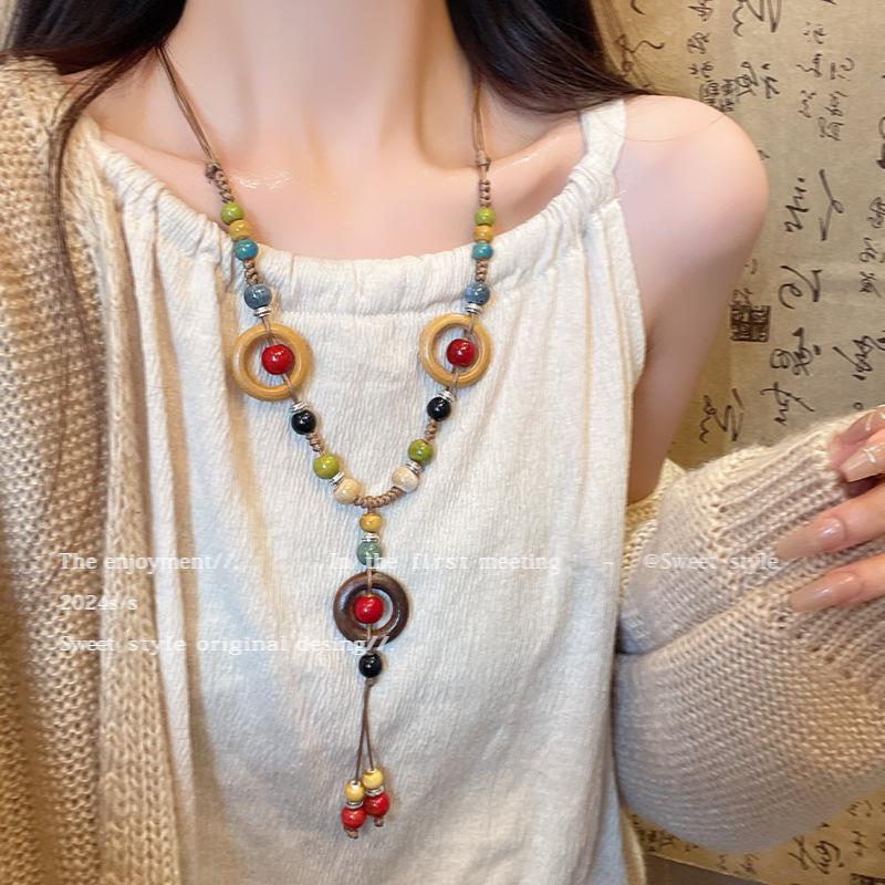 Retro pendant, ethnic style ceramic butterfly bell necklace, women's new trendy long sweater chain with accessories