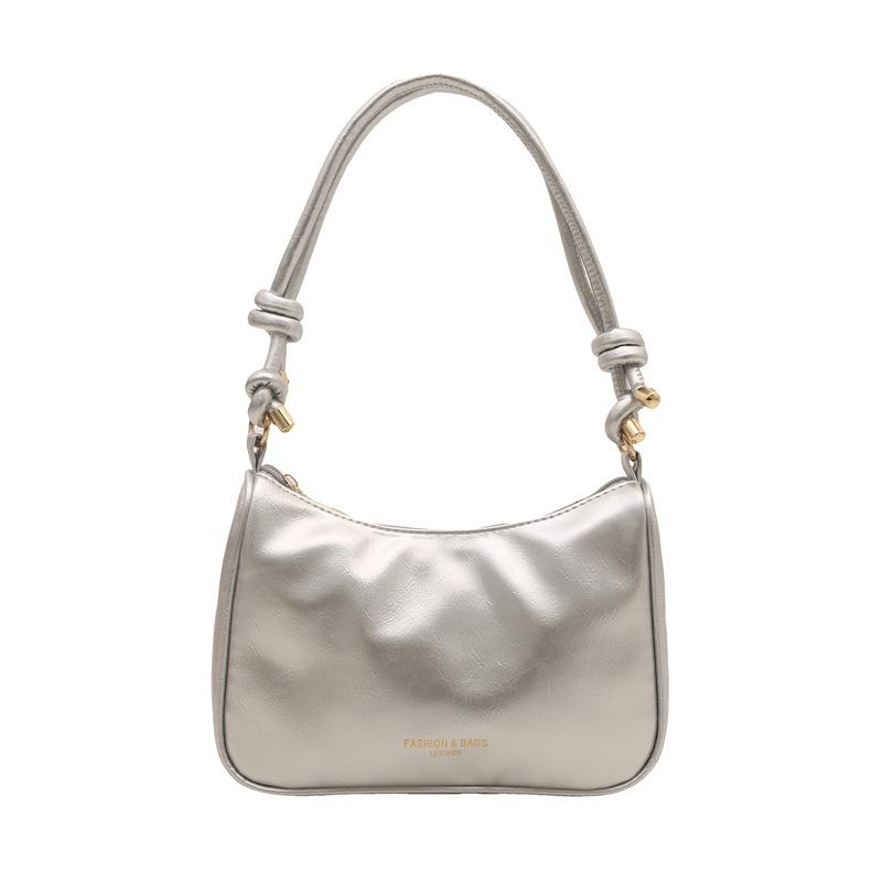 

Premium silver small bag women s 2025 new spring and summer versatile baguette messenger bag fashion shoulder armpit bag срібний
