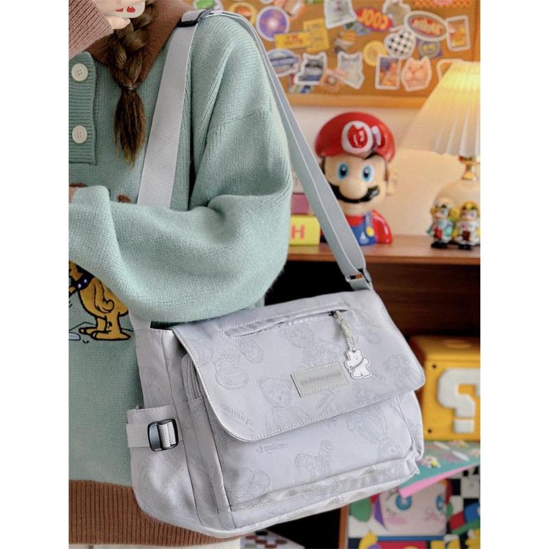 

Retro bear messenger bag women s large-capacity versatile messenger bag male student female messenger bag сірий колір