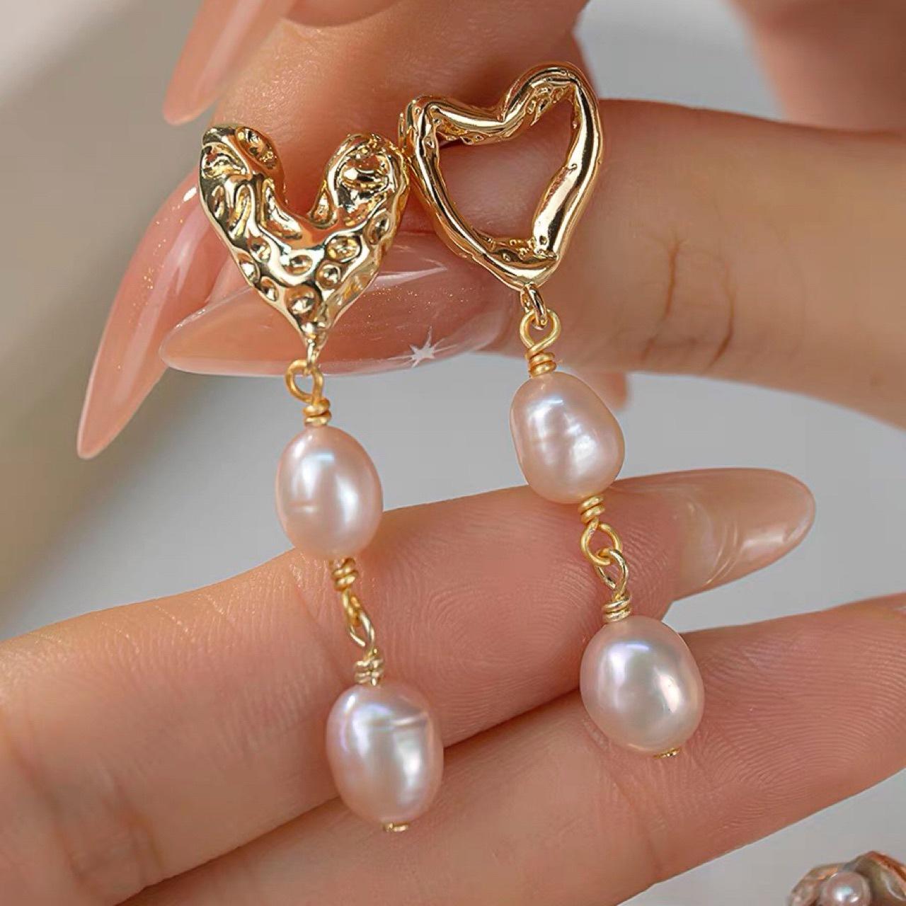 

Asymmetrical love natural freshwater baroque powder pearl earrings women s stud earrings niche design versatile light luxury earrings Silver needle
