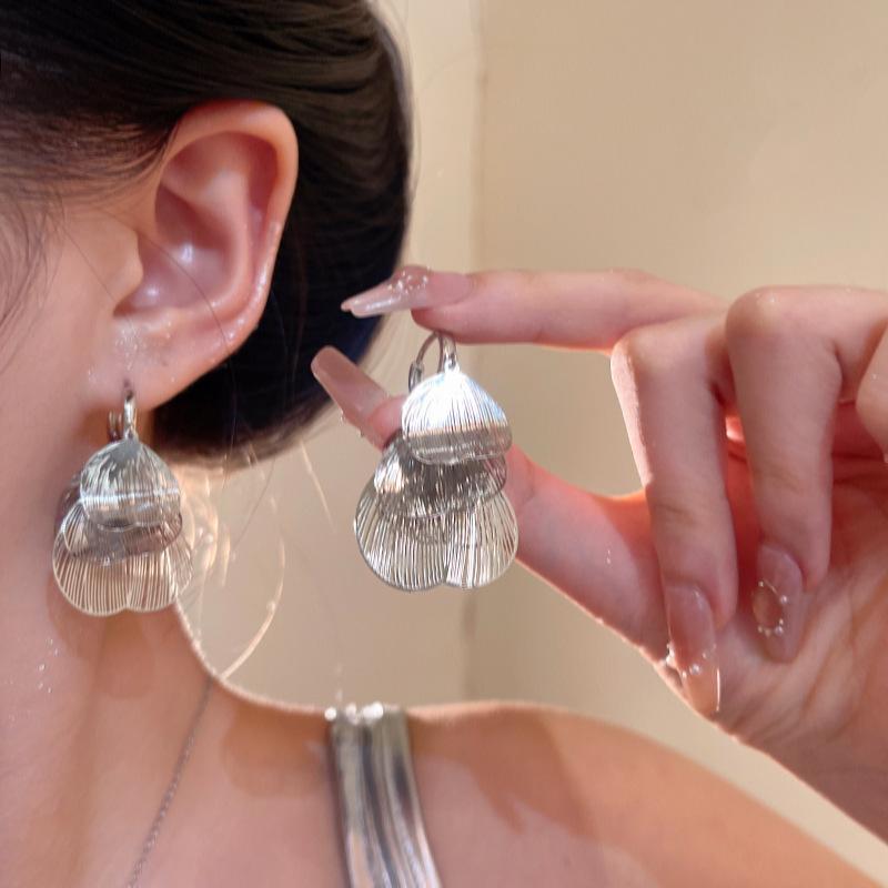 Hollow petals fringed silver ear buckles women's cold wind design light luxury unique earrings ear jewelry