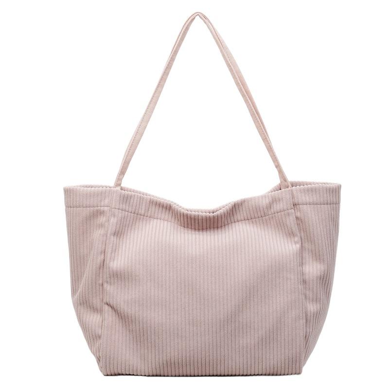 

New corduroy solid color large-capacity tote bag retro simple women s bag strip velvet simple shoulder bag розовый